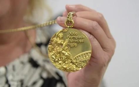 一枚金牌值多少人民币，最高拍卖了128万元人民币